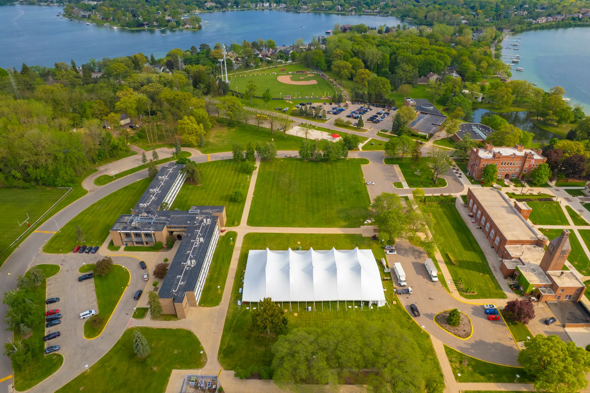 Aerial view of a 100 foot wide high tension fabric tent rental at a large-scale Michigan event venue